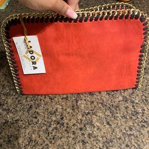 Red leather clutch
